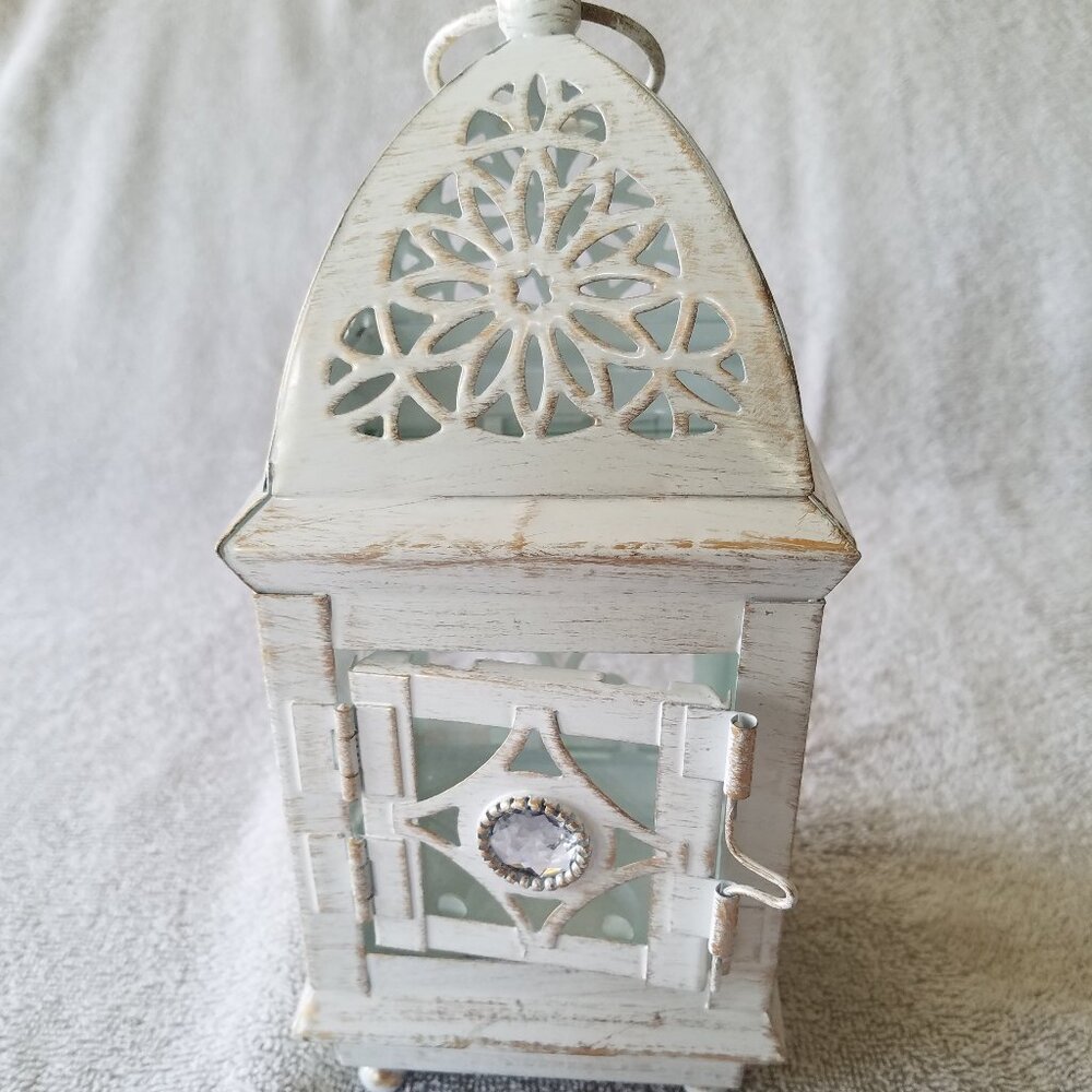 ASHLAND'S ELEGANT ANTIQUE LANTERN IN OFF WHITE WITH DISTRESSED DESIGN IN METAL